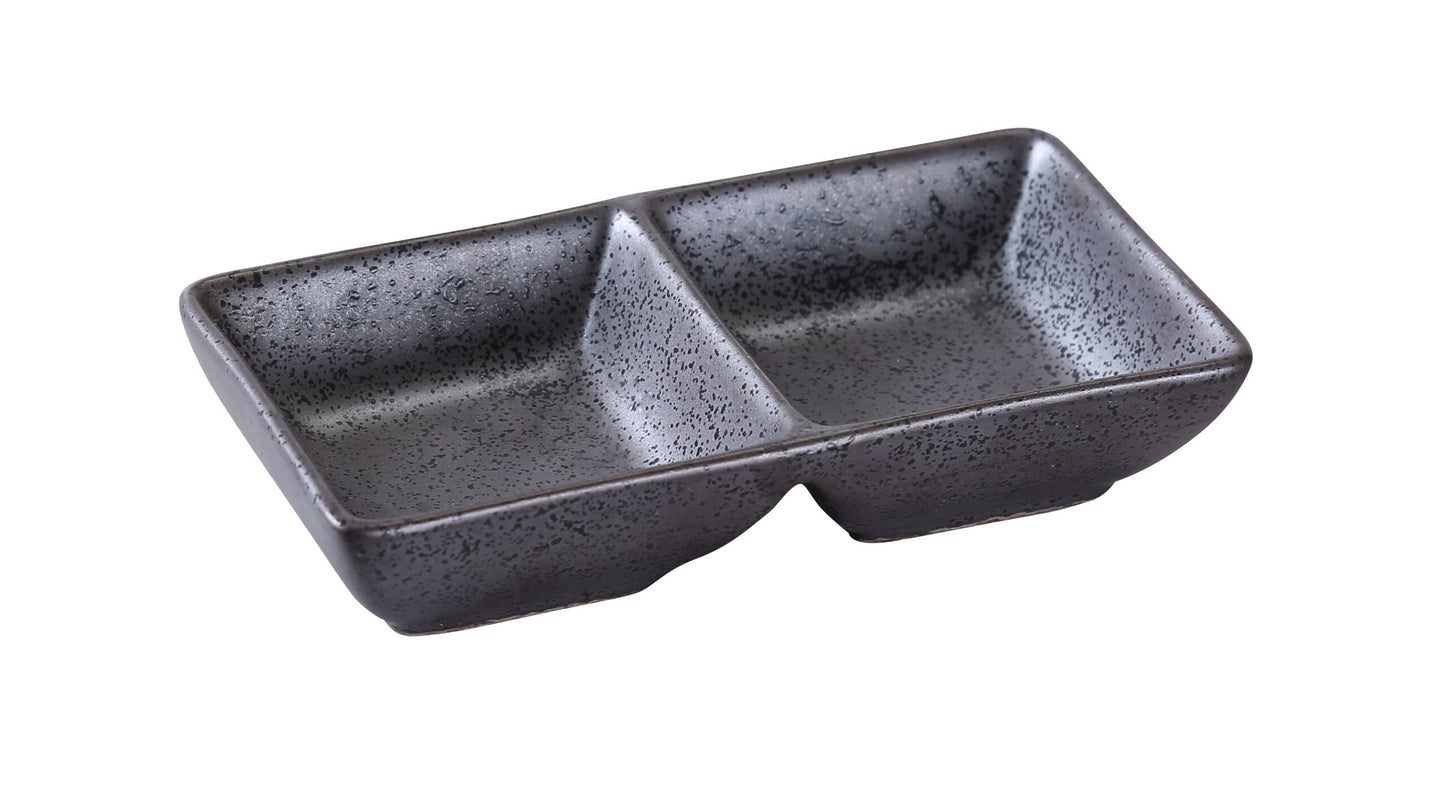 Yanco Double Sauce Dish DB-4032 is a perfect solution for those who look for an elegant and high-quality tableware for food-serving establishment. This color glazed porcelain dish is ideal for serving dips, sauces, and desserts. The stylish Diamond Black collection design will perfectly fit any establishment. It can be used in restaurants, catered events, outdoor dining areas or even hotels. These rectangular dishes are a stylish and reliable dinnerware solution for your business.