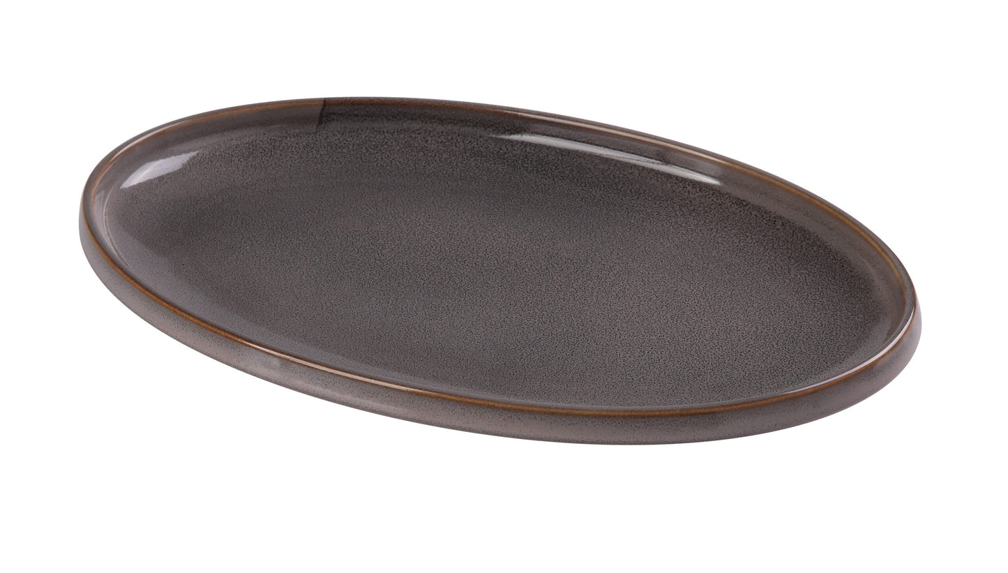Yanco Oval Plate PK-314 brings a refined, modern elegance to any dining presentation with its smooth oval silhouette and signature gray grainy glaze. Designed for entrées, shareable dishes, appetizers, and chef-forward plating, this 14 × 9-inch porcelain plate delivers both beauty and durability. Its subtle earth-tone finish elevates food contrast, making every dish stand out effortlessly in restaurants, hotels, catering services, or stylish home dining.