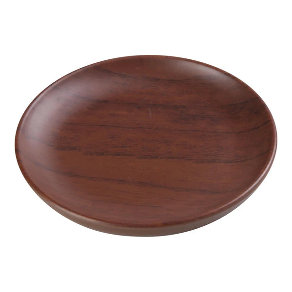Yanco Round Plate WL-104 is a stylish and durable addition to any dining setting. Measuring 4.75 inches in diameter and 0.5 inches in height, this compact plate is ideal for serving bread, small appetizers, or side dishes. Crafted from high-quality melamine, it features an elegant wood-grain finish that adds a rustic charm to table presentations. Its break-resistant construction ensures long-lasting use in busy restaurants, cafes, and hotels.