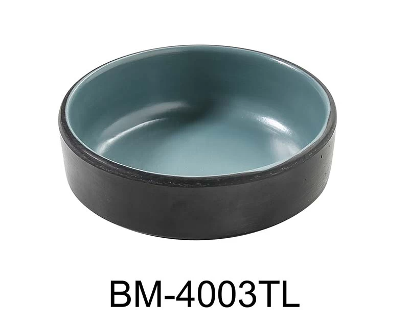 Yanco Sauce Dish BM-4003TL is a charming and practical addition to your dining collection. Measuring 3" in diameter and 1" deep, this round dish holds up to 2 ounces, making it perfect for serving sauces, dips, or condiments. Featuring a stylish gray and teal design, it effortlessly complements any table setting. Made from durable melamine, it’s both lightweight and easy to clean, ensuring it’s ready for everyday use or special occasions.
