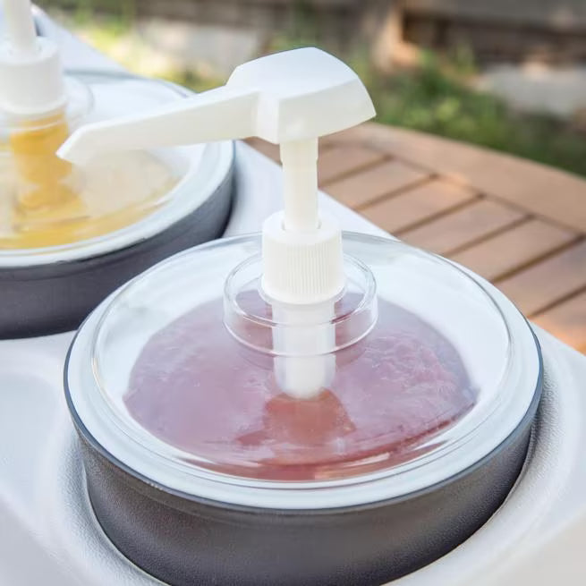 Shop the Coldmaster Clear Cold Crock Pump Lid with a shatter-resistant acrylic design and portion-control pump nozzle. Ideal for dispensing condiments while maintaining optimal cold temperatures in commercial foodservice.