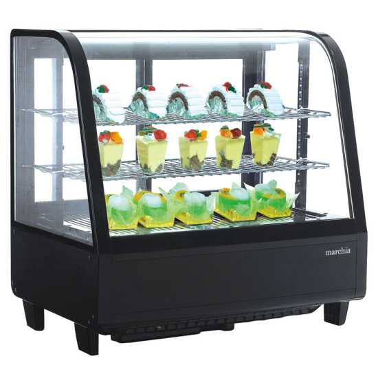 Marchia MDC100 27" Black Countertop Refrigerated Bakery Display Case with curved glass and LED lighting. Features a compact design for showcasing and keeping baked goods cool and illuminated.