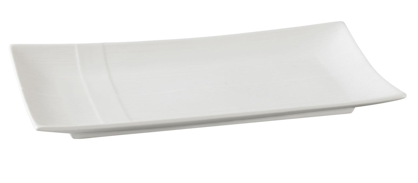 Yanco Rectangular Plate SH-213 is a refined and durable addition to any tableware collection. Crafted from high-quality porcelain, it features a smooth white glaze that enhances its elegant appearance while ensuring long-lasting performance. With its 13.5 x 6.5-inch rectangular design, this plate is ideal for serving salads, pasta, appetizers, and hot meals. Perfect for fine dining restaurants, catered events, and hotels, it combines sophistication with practicality.