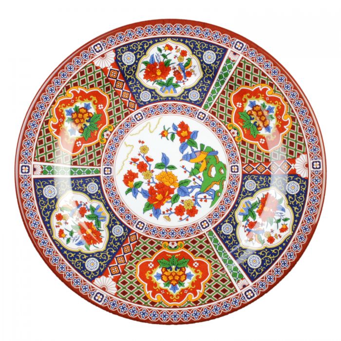 The Thunder Group Round Plate features a bright multi-colored design with floral and geometric patterns, adding authentic Asian flair to any setting. Made from durable melamine, it is BPA-free, break-resistant, shatter-resistant, lightweight, and stackable for easy handling and storage. Dishwasher safe and NSF listed, it’s ideal for serving appetizers, entrees, desserts, and more at restaurants, catered events, or home use.