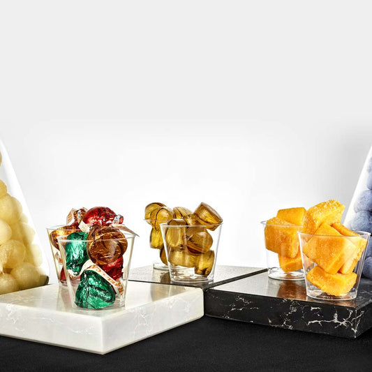 Premium 1oz disposable shot cups for parties, weddings, and events. Clear plastic shooters perfect for tequila, whiskey, and vodka shots. Durable, stylish, and hassle-free for easy cleanup.