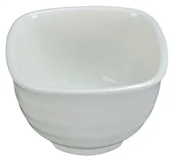 Yanco Square Bowl MD-705 This square-shaped bowl is designed with a sleek and modern look that is sure to impress your guests. With a generous capacity of 16 oz. it's large enough to serve your favorite soups, salads, or pasta dishes. Measuring 5"L x 5"W x 3"H, this bowl is just the right size for any meal or snack. Made of durable melamine, this bowl is built to last. It is dishwasher safe, making it easy to clean and maintain its pristine appearance.