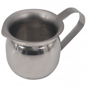 3 oz. bell creamer stanton trading made of stainless steel with a sleek, polished design makes it ideal for serving cream, milk, or syrups in cafes, restaurants, and catering settings. The sturdy handle and spout ensure easy pouring, while the stainless steel construction provides durability and easy cleaning.