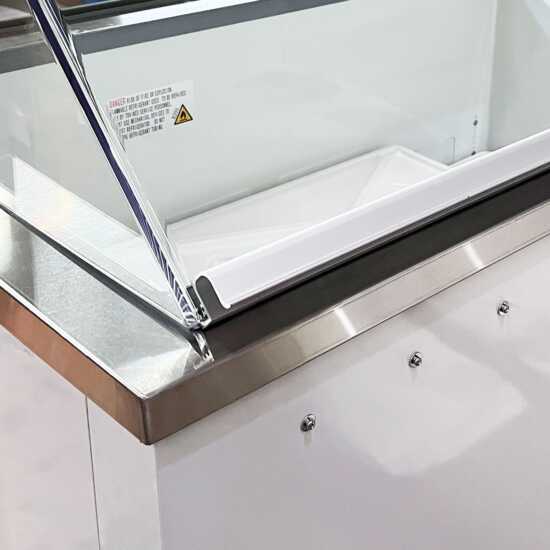 The Coldline DIP-66 is a 68" ice cream dipping cabinet freezer with a 12-tub capacity, designed for commercial use in ice cream shops. It keeps ice cream at optimal serving temperature for easy scooping.