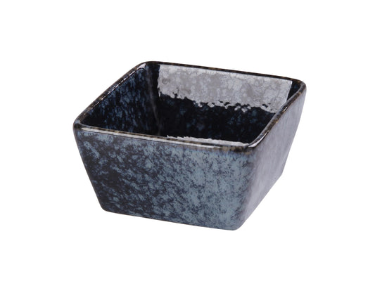 Yanco Square Sauce Dish BL-4031 is a stylish and functional addition to any table setting. Crafted from high-quality porcelain with a smooth glaze finish, this square dish features a striking blue star design that enhances food presentation. Measuring 3 1/2" Length x 3" Width x 1 3/4" Height and holding 3.5 oz, it is perfect for serving condiments, sauces, and dips. 