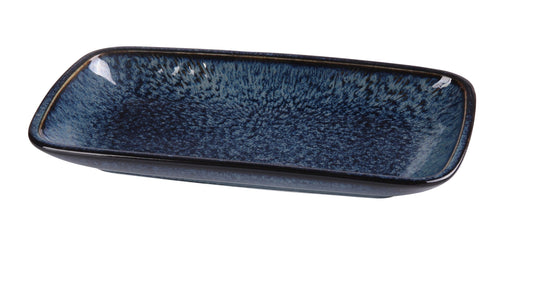 Yanco Rectangular Plate BL-512 is a stylish and functional addition to any dining setting. Made from high-quality porcelain with a sleek glaze finish, this rectangular plate features an elegant blue star pattern that enhances food presentation. Its rolled edge design adds a sophisticated touch while helping to prevent spills. Designed for versatility, this plate is ideal for serving appetizers, entrees, and desserts. 