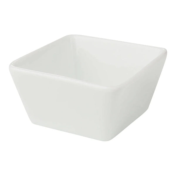 Yanco Square Sauce Dish CA-4031 is a stylish and practical choice for serving sauces and condiments. Measuring 3 1/4" in length, 3 1/4" in width, and 1 3/4" in height, it offers a 4 oz capacity while maintaining a sleek, modern look. Made from high-quality porcelain with a bright white finish, this dish enhances presentation and withstands the demands of busy restaurants, hotels, and cafes. Its square shape keeps sauces contained while allowing for easy access. 