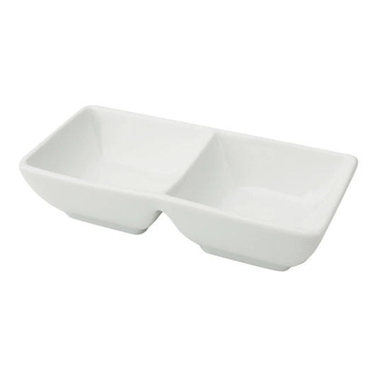 Yanco Double Sauce Dish CA-4032 is a practical and stylish solution for serving multiple condiments at once. Measuring 5 1/2" in length, 2 3/4" in width, and 1 3/8" in height, it features two compartments, each holding 2 oz, making it ideal for pairing sauces, dips, or seasonings. Crafted from high-quality porcelain with a bright white finish, this dish enhances food presentation while offering durability for busy restaurants, hotels, and cafes. 