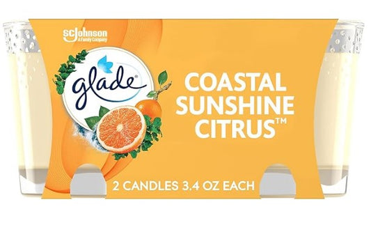 Two Glade Coastal Sunshine Citrus scented candles in glass jars, 3.4 oz each, with a bright, refreshing citrus fragrance.