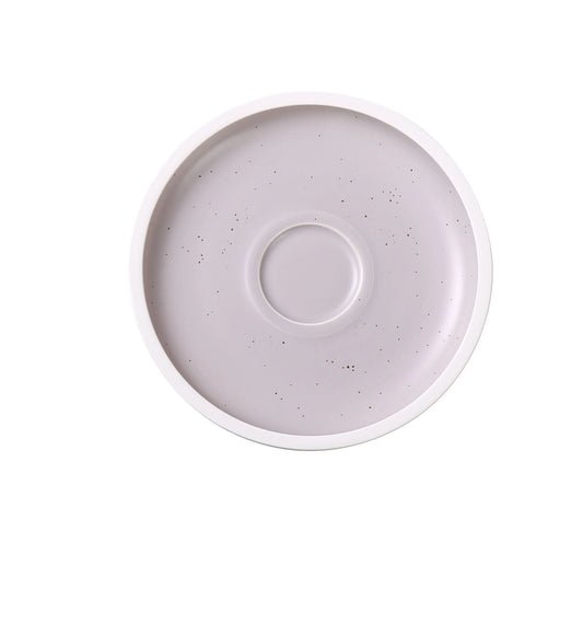 Yanco Saucer DM-002 combines durability with minimalist elegance. Crafted from premium porcelain, this 5 1/2-inch saucer features a refined light gray hue, creating a sophisticated backdrop for coffee and tea service. Its sleek design seamlessly complements upscale table settings, making it an excellent choice for restaurants, cafes, and hospitality venues. Designed for convenience, this saucer is both dishwasher and microwave safe, ensuring effortless maintenance in busy food service environments.