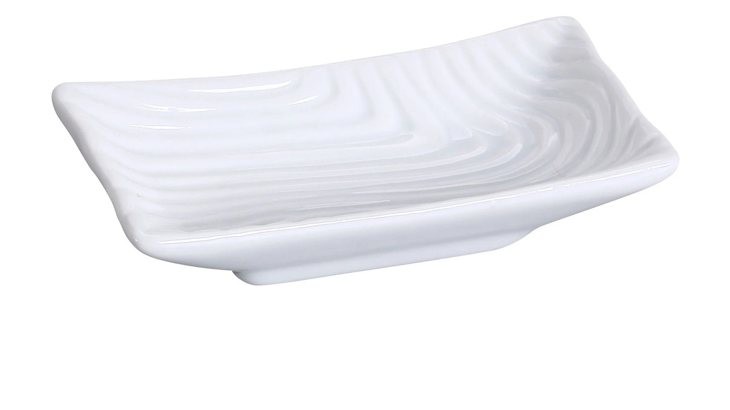 Yanco Sauce Dish FU-903 is a stylish and practical addition to any tableware collection. Measuring 3 1/2" Length x 2" Width and holding 1 1/2 oz, this dish is perfect for serving sauces, dips, and condiments. Crafted from high-quality porcelain in a classic bone white finish, it combines elegance with durability. Its versatile design makes it ideal for pairing with sushi, appetizers, and a variety of dishes. 