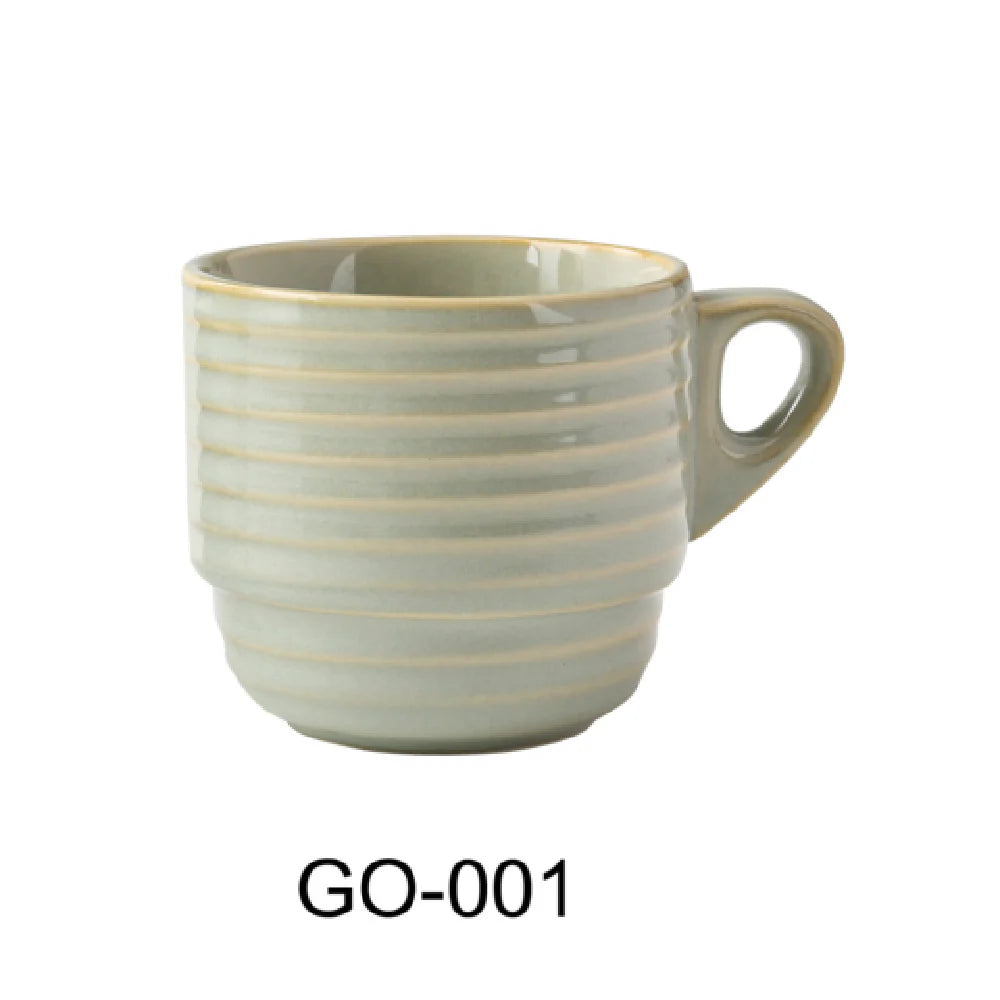 Yanco Stackable Cup GO-001 is a stylish and functional addition to any table setting. Part of the Golden Coast collection, this chinaware cup features elegant earthy tones and concentric circles, beautifully complemented by a golden rim for a sophisticated touch.&nbsp;Designed for convenience, its stackable shape allows for easy storage without compromising style. The tea green color adds warmth and charm, making it perfect for restaurants, cafés, and upscale dining settings.