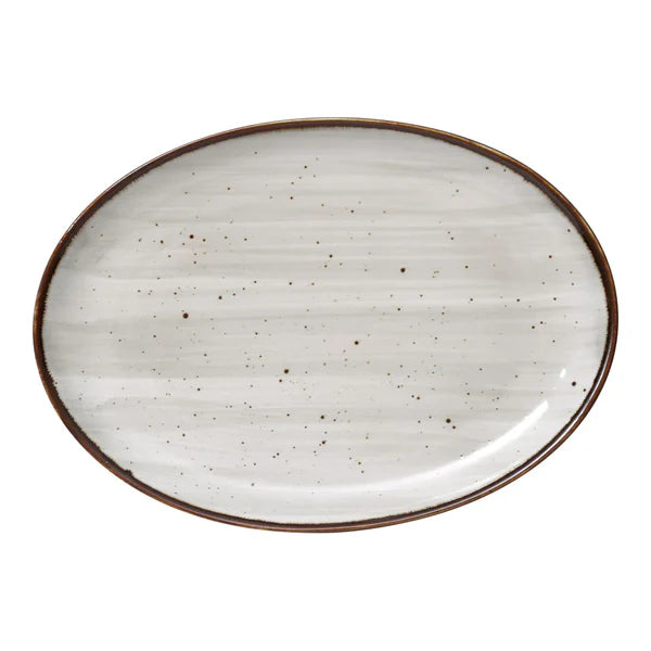 Yanco Coupe Platter LY-2110 is a stylish and versatile addition to any dining setup. Crafted from high-quality porcelain, this platter features a reactive glaze with distinctive brown speckles, adding a rustic yet elegant touch. Its oval shape provides a unique presentation, making it ideal for serving appetizers, main courses, or decorative displays. Built for durability, this platter is designed for high-traffic environments like restaurants, hotels, and cafes. 