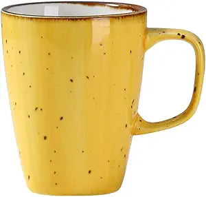 Yanco Mug LY-503YL is a stylish and durable choice for any food-service establishment. Made from high-quality porcelain with a sleek color-glazed finish, this mug is perfect for serving hot or cold beverages, including coffee, tea, and cocoa. Its elegant design enhances the presentation in fine-dining restaurants, cafes, and catering events. With a comfortable 10 oz capacity, it ensures the perfect serving size for your guests. 