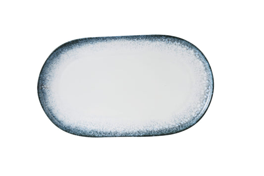 Yanco Coupe Oval Plate MR-214 is a bold and elegant serving piece designed for main courses and shared platters. Featuring a wide surface and clean coupe edge, this 13 5/8" oval plate is finished with a stylish midnight blue rim that adds depth and sophistication to your presentation. Its durable porcelain construction makes it suitable for busy dining environments while maintaining a refined look.