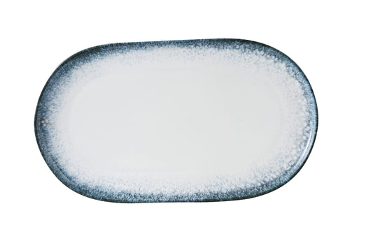 Yanco Coupe Oval Plate MR-215 is a bold and elegant serving piece designed for main courses and shared platters. Featuring a wide surface and clean coupe edge, this 13 5/8" oval plate is finished with a stylish midnight blue rim that adds depth and sophistication to your presentation. Its durable porcelain construction makes it suitable for busy dining environments while maintaining a refined look.