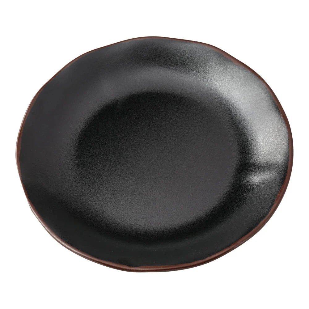 Yanco Round Plate NA-110BK Crafted from durable melamine, offering a reliable solution for both commercial and residential use. The melamine construction provides excellent break resistance, making it ideal for busy restaurants, hotels, and cafes where durability is essential. Finished in a sophisticated black color with a subtle brown rim, this plate complements a variety of table settings and enhances the presentation of bread, butter, or small side dishes. 