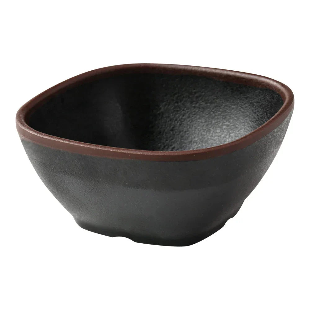 Yanco Square Miso Soup Bowl NA-505BK Made from high-quality melamine, this server is durable and lightweight. Its square shape and break-resistant nature make it ideal for frequent use in commercial dining settings. This server is designed to be dishwasher safe, ensuring easy and efficient cleaning, which is essential for high-turnover environments. The black color with a speckled finish and brown rim adds a touch of elegance to the presentation of sauces and condiments. 