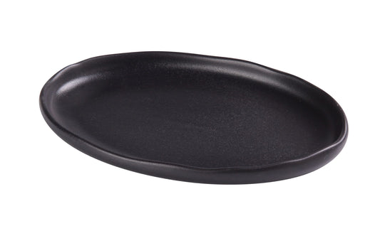 Yanco Oval Plate NB-210 delivers a sleek, modern presentation with its matte black porcelain finish and organic hand-formed rim. Its elongated 10.5 by 7 inch shape is ideal for appetizers, shared plates, desserts, sushi, or tasting portions. The subtle organic rim and understated matte texture create a dramatic backdrop that enhances the visual appeal of any dish.