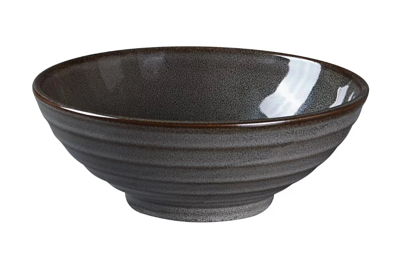 Yanco Ramen/Noodle Bowl PK-808 enhances modern dining with its deep round form and signature gray grainy glaze. This 8.5-inch ramen and noodle bowl offers a generous 45 oz capacity, making it ideal for ramen, udon, pho, noodle dishes, curries, rice bowls, or hearty entrées. Its handcrafted look pairs with durable commercial-grade porcelain, making it a reliable and stylish choice for restaurants, hotels, catering services, or elevated home kitchens.