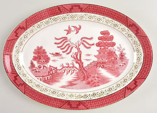 Platter R.E. Red 12 1/2" (12/Case) – A vibrant 12 1/2-inch red platter, perfect for serving entrées, appetizers, or shared dishes. Made from durable, high-quality stoneware, ideal for restaurants, cafés, and colorful table presentations.