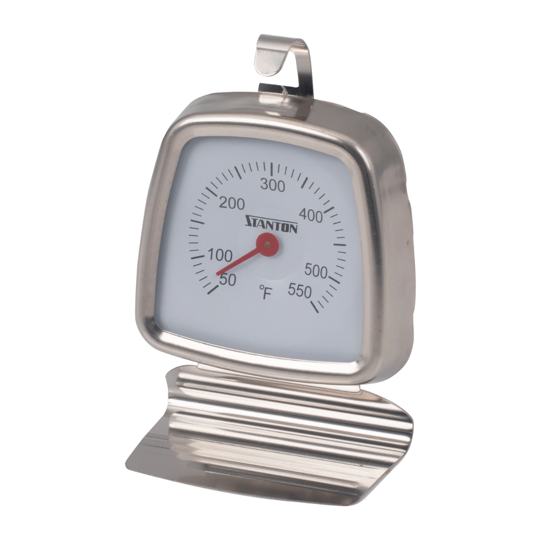 stainless steel oven thermometer stanton trading with a temperature range of 50 to 550°f, featuring a clear dial for easy reading and a versatile stand or hook design for convenient placement.