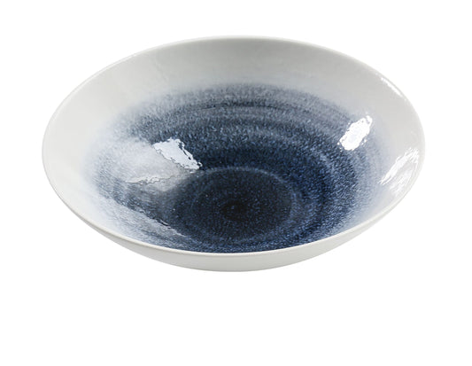 Yanco Ramen Bowl UN-610 brings modern elegance to the table with its deep blue cosmic swirl and smooth coupe profile. Designed for ramen, noodle dishes, hearty soups, and chef-crafted entrées, this bowl combines visual impact with reliable commercial durability. Its refined glaze draws the eye to the center of the dish, enhancing food presentation in restaurants, hotels, catering setups, or contemporary home dining.