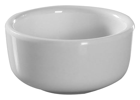 Yanco Sauce Dish VE-002 is a durable and stylish choice for serving sauces, dips, spices, and herbs in any food-service establishment. With a 2 oz. capacity and a compact 2.5-inch diameter, this dish is crafted from high-quality melamine, offering the appearance of ceramic while being resistant to chipping, breaking, and staining. Designed in an elegant Italian-inspired style, it seamlessly complements various restaurant décors, from casual cafés to fine dining establishments. 