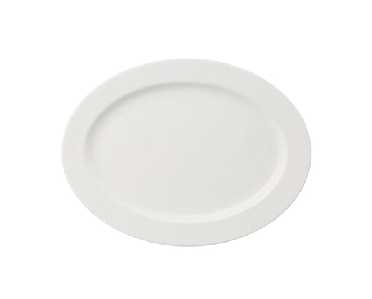 Yanco Platter VS-212 offers a graceful and durable option for presenting main courses, shared dishes, or elegant entrée displays. Crafted from fully glazed porcelain with a strong magnesia body, this bone white platter from the Versailles collection enhances fine dining experiences in restaurants, hotels, and special events.