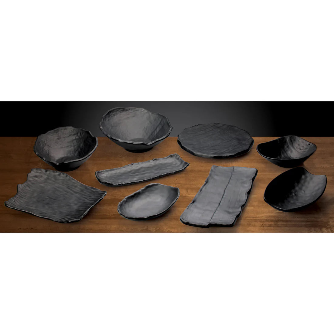 Winco WDM019-304 8-3/4" x 5-3/4", 24pcs Black Melamine Oval Bowl