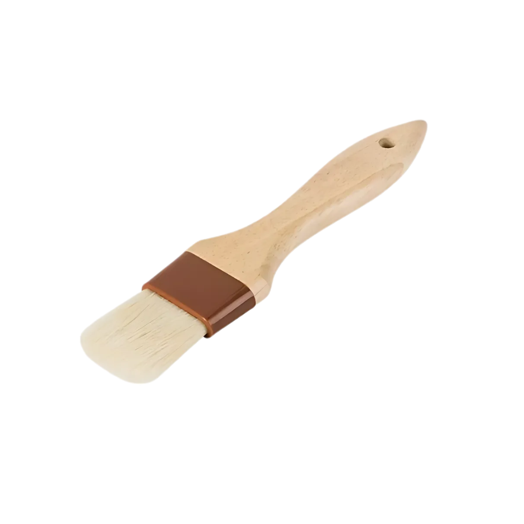 1-inch wide flat pastry brush stanton trading with natural bristles, a sturdy wooden handle, and durable plastic ferrules. Designed for precision in baking and cooking, ideal for glazing, basting, and buttering. Comfortable grip and lightweight construction for ease of use.