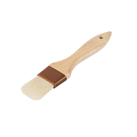 1-inch wide flat pastry brush stanton trading with natural bristles, a sturdy wooden handle, and durable plastic ferrules. Designed for precision in baking and cooking, ideal for glazing, basting, and buttering. Comfortable grip and lightweight construction for ease of use.