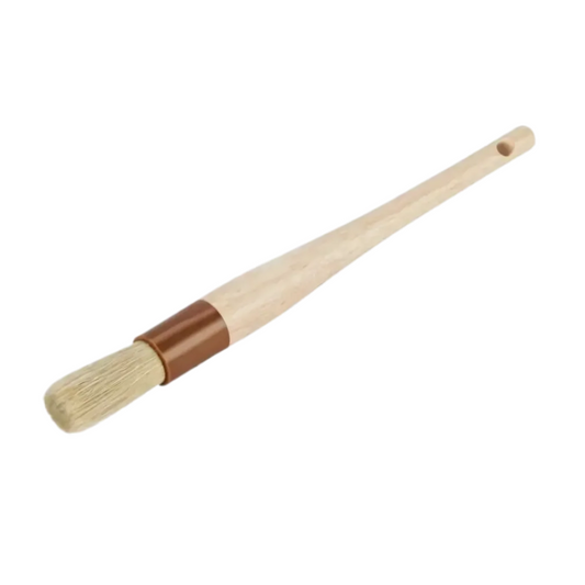 1-inch round pastry brush stanton trading with natural bristles, a sturdy wooden handle, and durable plastic ferrules. Ideal for precise glazing, basting, or butter application. The ergonomic tapered handle provides a comfortable grip for efficient baking and cooking use.