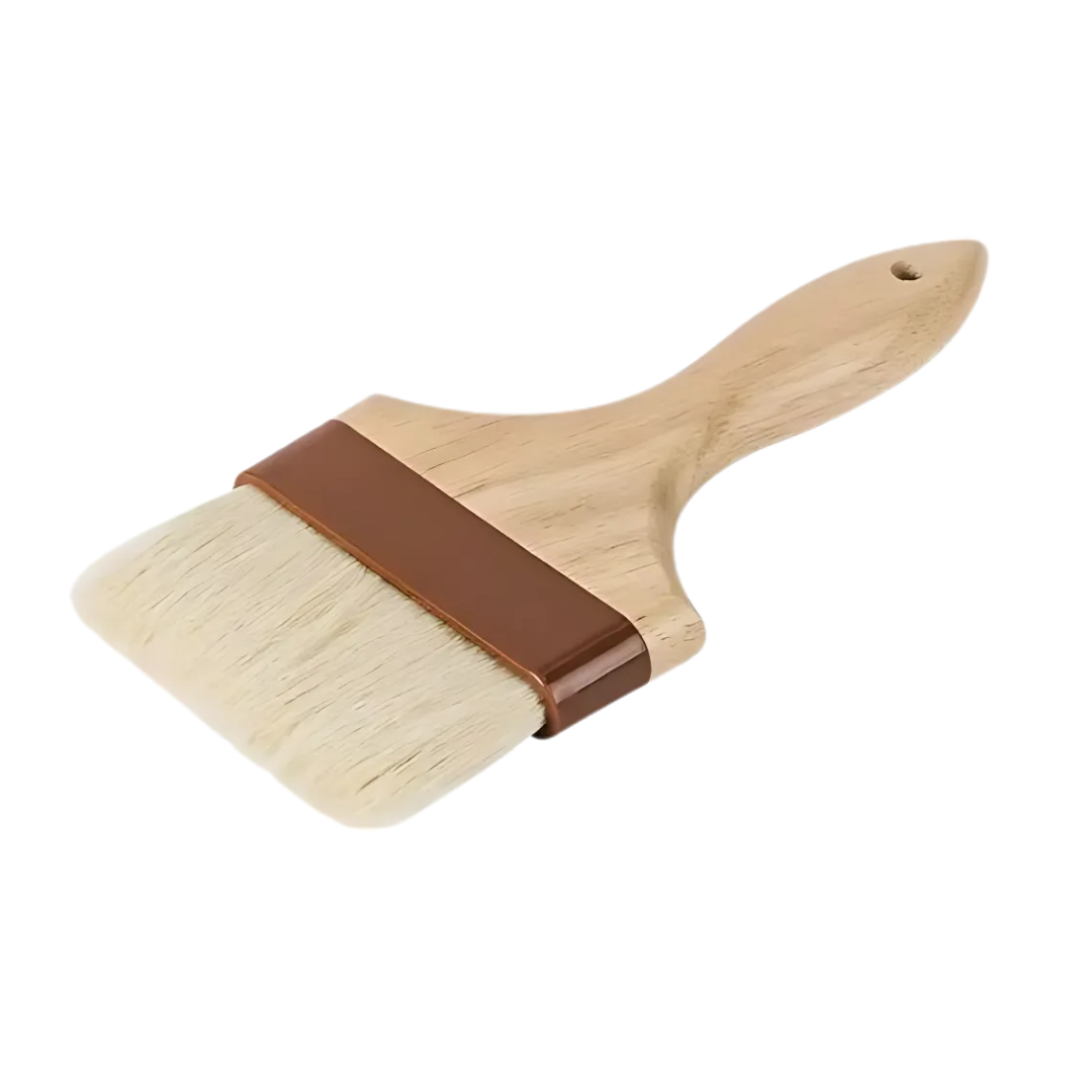 4-inch wide flat pastry brush stanton trading with natural bristles, a sturdy wooden handle, and durable plastic ferrules. Designed for precision in baking and cooking, ideal for glazing, basting, and buttering. Comfortable grip and lightweight construction for ease of use.