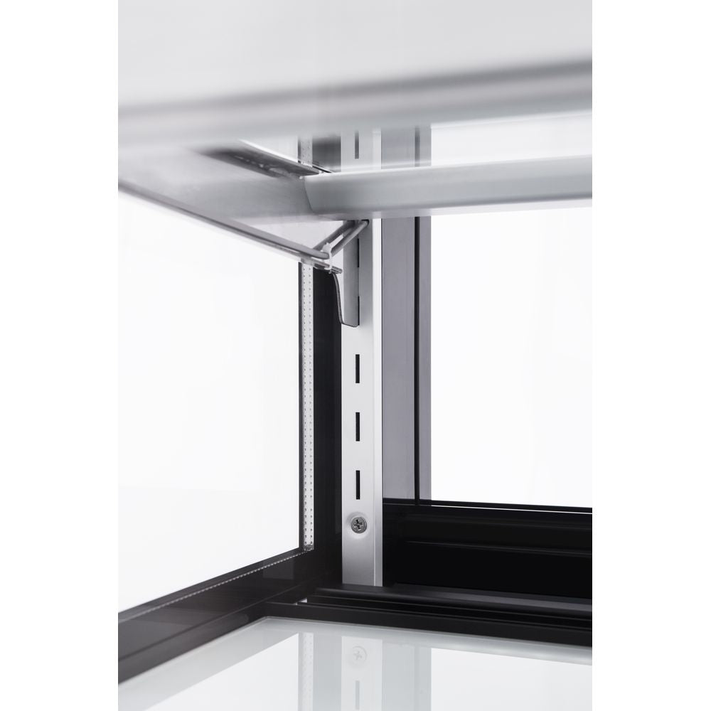 The Marchia MB60-B 60-inch Black Curved Glass Refrigerated Bakery Display Case, designed to showcase a variety of pastries, cakes, and desserts while keeping them fresh and cool. Ideal for bakeries, cafés, and delis.