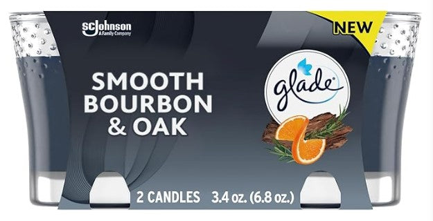 Two Glade Smooth Bourbon Oak scented candles in glass jars, 3.4 oz each, with a rich, warm bourbon oak fragrance.