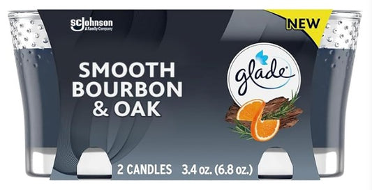 Two Glade Smooth Bourbon Oak scented candles in glass jars, 3.4 oz each, with a rich, warm bourbon oak fragrance.