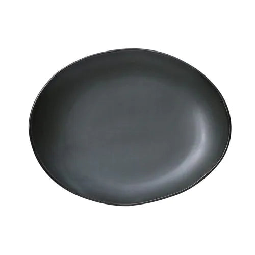 Yanco Oval Plate CH-213 combines elegance with durability, making it a versatile choice for any dining setting. Crafted from high-quality porcelain, this plate features a deep green color with a matte finish, providing a striking backdrop for a variety of dishes. Its oval shape adds a modern touch, perfect for restaurants, cafes, and hospitality venues. Designed for convenience, this plate is dishwasher, microwave, and oven safe, ensuring easy maintenance in busy food service environments.