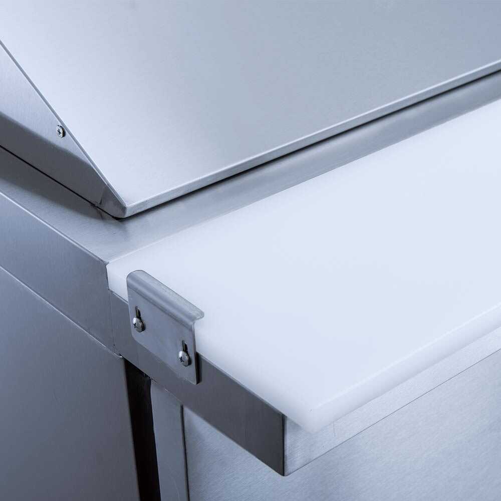 Coldline SMP72 72-inch mega top refrigerated sandwich prep table with cutting board and food pans. Ideal for large kitchens, allowing efficient storage of fresh ingredients and fast sandwich preparation.