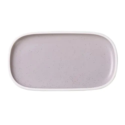 Yanco Rectangular Plate With Uptight Rim DM-312 Porcelain possesses exceptional durability, low porosity, and high density, ensuring long-lasting performance, safety, a pleasant tactile experience, and aesthetic appeal. The Denmark Collection by Yanco seamlessly blends minimalist and chic design elements, providing an elegant backdrop for your culinary creations. 