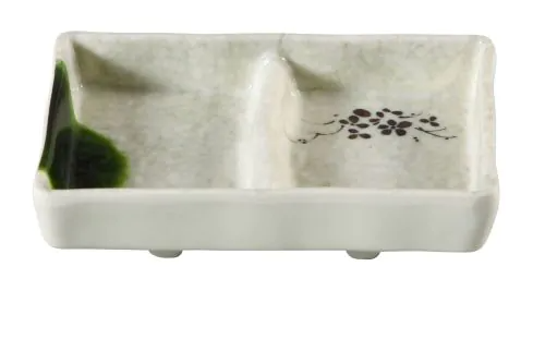 Yanco Double Divided Sauce Dish HO-4031 is a perfect solution to serve sauces, dips, spices, and herbs that accompany the oriental dishes in your food-serving establishment. Thanks to the high-quality, reliable and affordable melamine material, these sauce dishes can With stand the heavy commercial use. While looking like they are handmade ceramics such dishes won't chip, break, or stain. The Honda collection is performed in Japanese style, that will perfectly fit most of the establishments' designs.