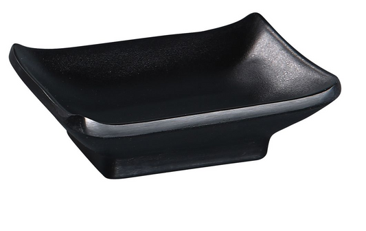 Yanco Sauce Dish BP-4046 is a stylish and durable choice for serving sauces, dips, spices, and herbs alongside oriental dishes. Made from high-quality melamine material, it offers the look of handmade ceramics while resisting chipping, breaking, or staining under heavy commercial use. Part of the Black Pearl collection, this dish features a matte black finish that complements a variety of dining environments. 