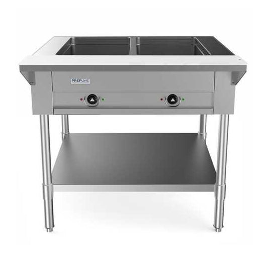 Prepline 32" two-well electric hot food steam table with undershelf is an essential appliance for commercial kitchens and catering services. Operating at 120V and 1000W, this steam table features two spacious wells designed to keep various dishes hot and ready for serving, making it ideal for buffets and food service events. Constructed from durable stainless steel, it ensures longevity and resistance to rust and corrosion. The undershelf provides convenient storage for utensils and supplies, optimizing wor