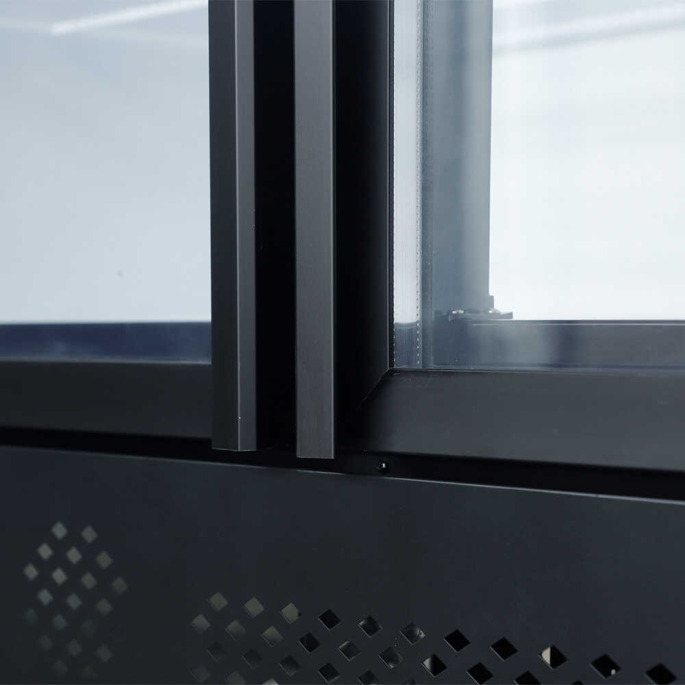 Coldline D4-B 98-inch four-glass door merchandiser freezer with LED lighting and a black exterior. This large unit offers excellent visibility and easy access for frozen products, perfect for high-traffic settings.