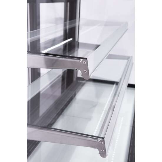 Marchia MB72 72-inch curved glass refrigerated bakery display case in stainless steel. Sleek design with adjustable shelves for showcasing cakes, pastries, and desserts. Ideal for bakeries, cafes, and restaurants needing a stylish and reliable display solution.