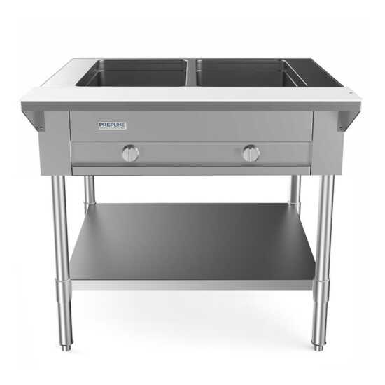 Prepline 32" two-well gas hot food steam table with undershelf is a vital piece of equipment for commercial kitchens and catering services. This steam table features two large wells, designed to keep food hot and ready to serve, making it ideal for buffets and food service events. The durable stainless steel construction ensures longevity and resistance to rust and corrosion, while the undershelf provides additional storage for utensils or supplies, optimizing workspace efficiency. With its practical design